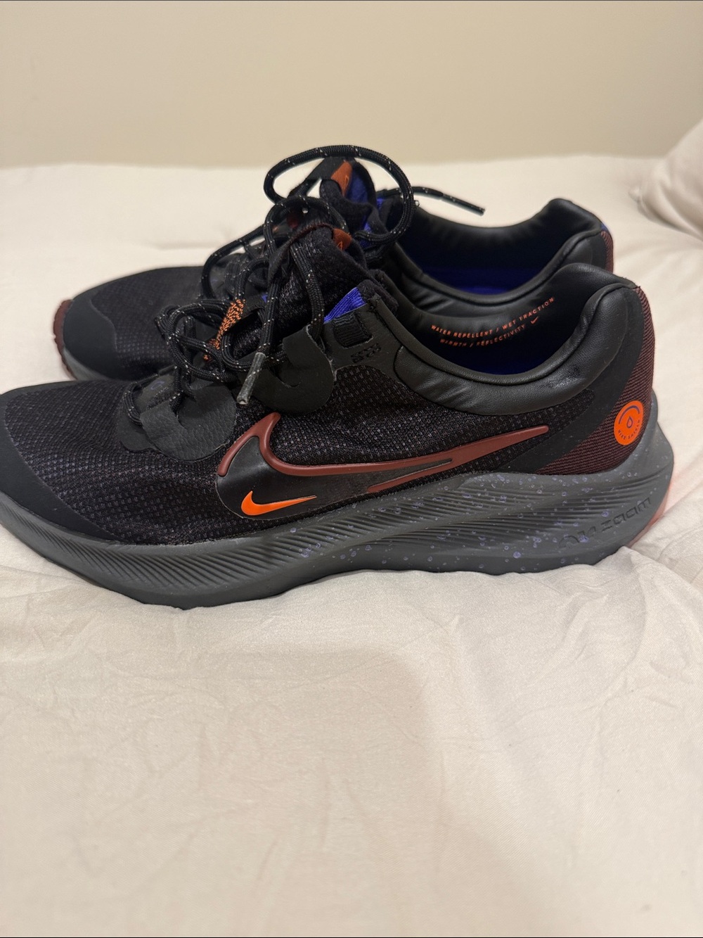 Nike Men’s Black with Orange Accent Training Sneakers